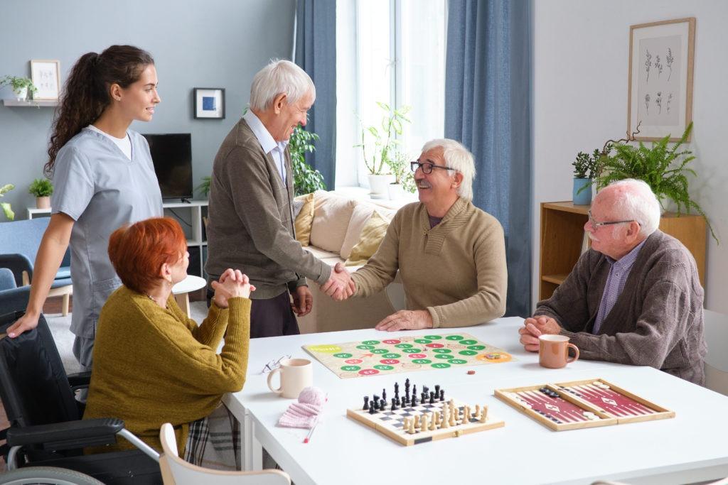 elderly playing game of chess